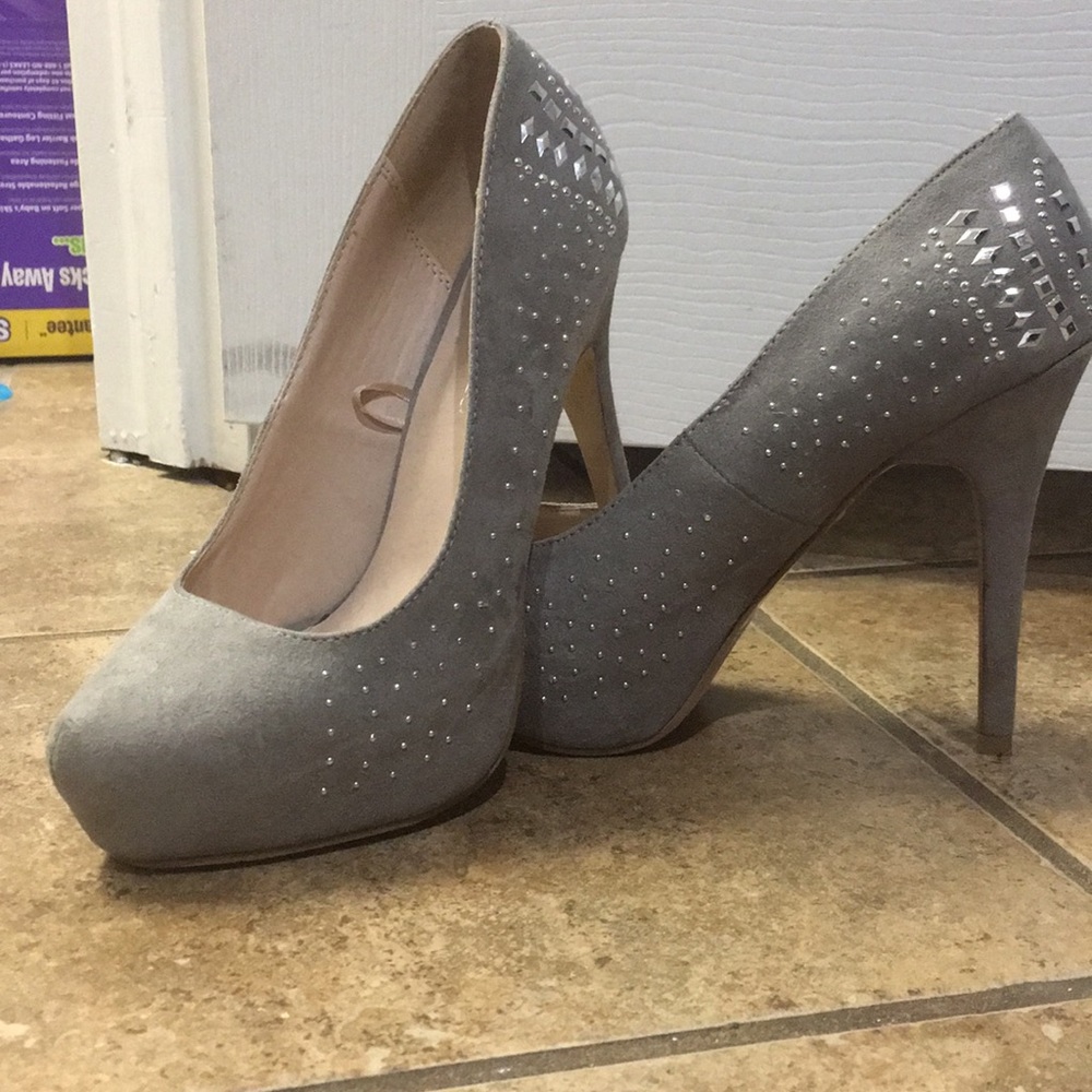 Grey heels with detailed embellishment